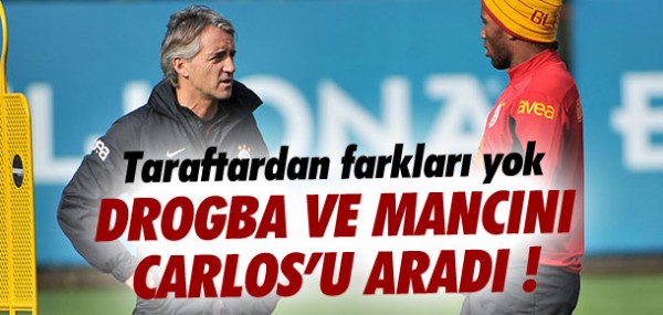 Drogba ve Mancini Carlos'u arad